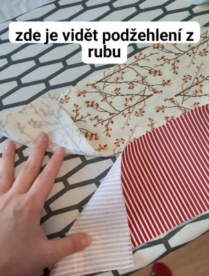 Zažehlený vlizelín z rubu dílů